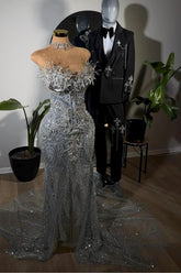 Silver strapless beaded mermaid prom dress