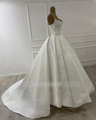 Elegant Ivory Scoop Sleeveless Ball Gown Wedding Dress with Beadings and Chapel Train
