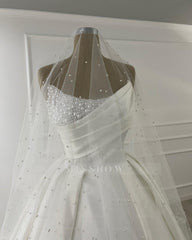 Elegant Ivory Scoop Sleeveless Ball Gown Wedding Dress with Beadings and Chapel Train