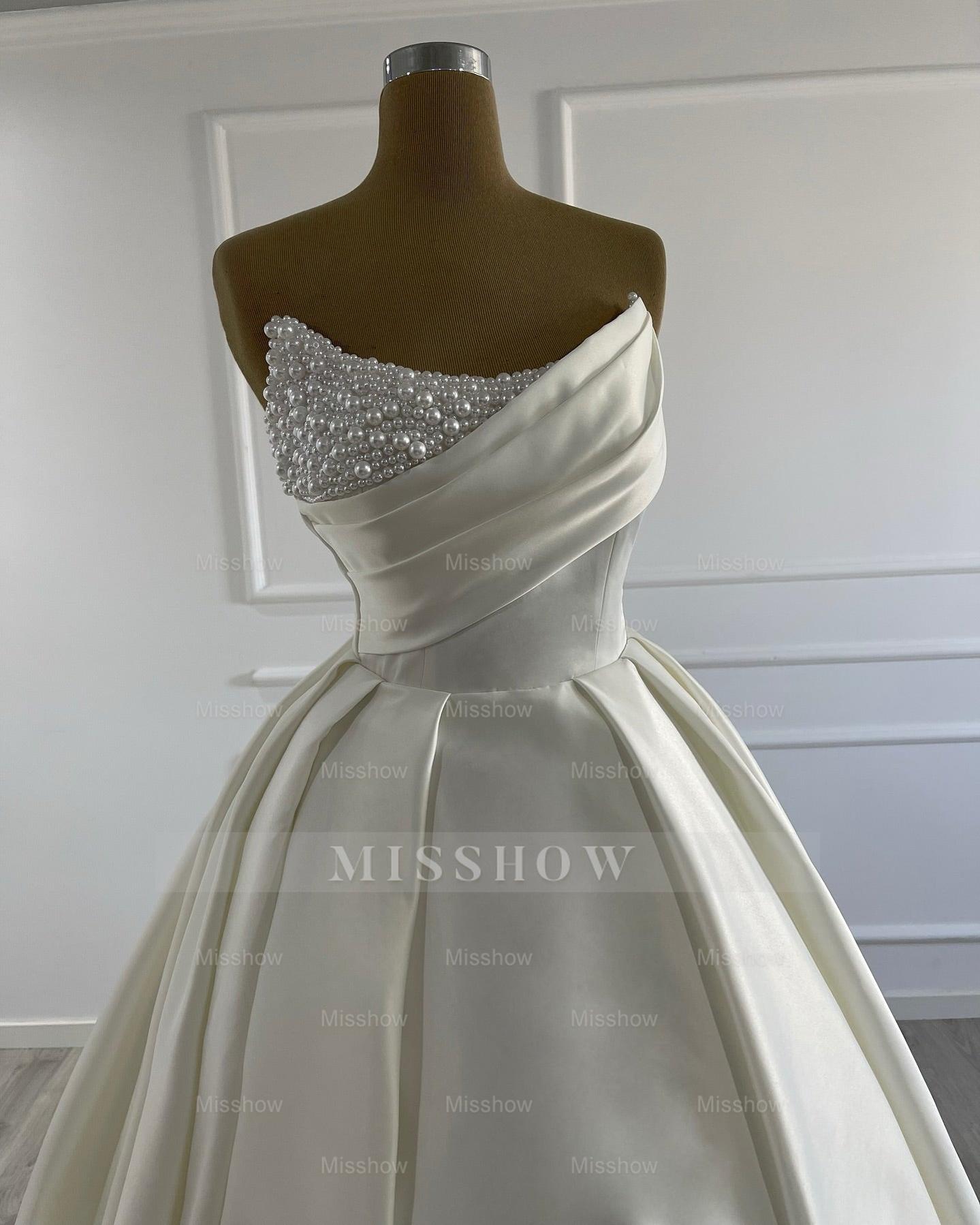 Elegant Ivory Scoop Sleeveless Ball Gown Wedding Dress with Beadings and Chapel Train