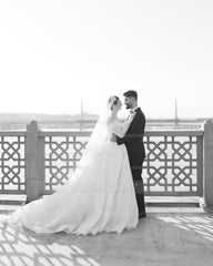 Elegant Ivory Strapless Long-Sleeve Ball Gown Wedding Dress with Chapel Train