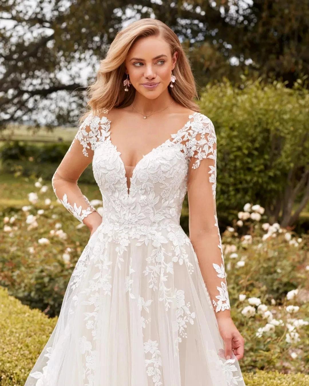 Ivory Lace Applique A-line Wedding Dress V-neck Long Sleeves Illusion Open Back Cathedral Train Bridal Gown