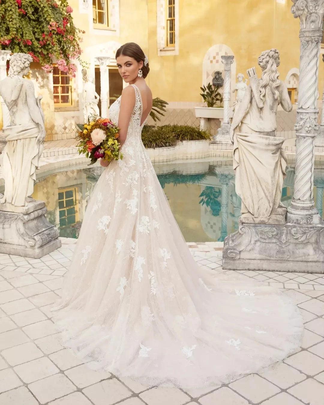Ivory Lace Applique A-line Wedding Dress V-neck Sleeveless Open Back Cathedral Train Bridal Gown