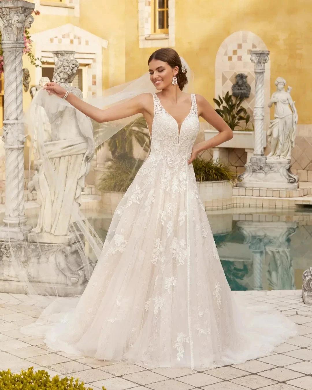 Ivory Lace Applique A-line Wedding Dress V-neck Sleeveless Open Back Cathedral Train Bridal Gown