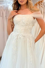 Ivory Tulle A-Line Wedding Dress Strapless 3D Floral Lace Applique Corset Off-Shoulder Wrap Sweep Train Bridal Gown with Pockets
