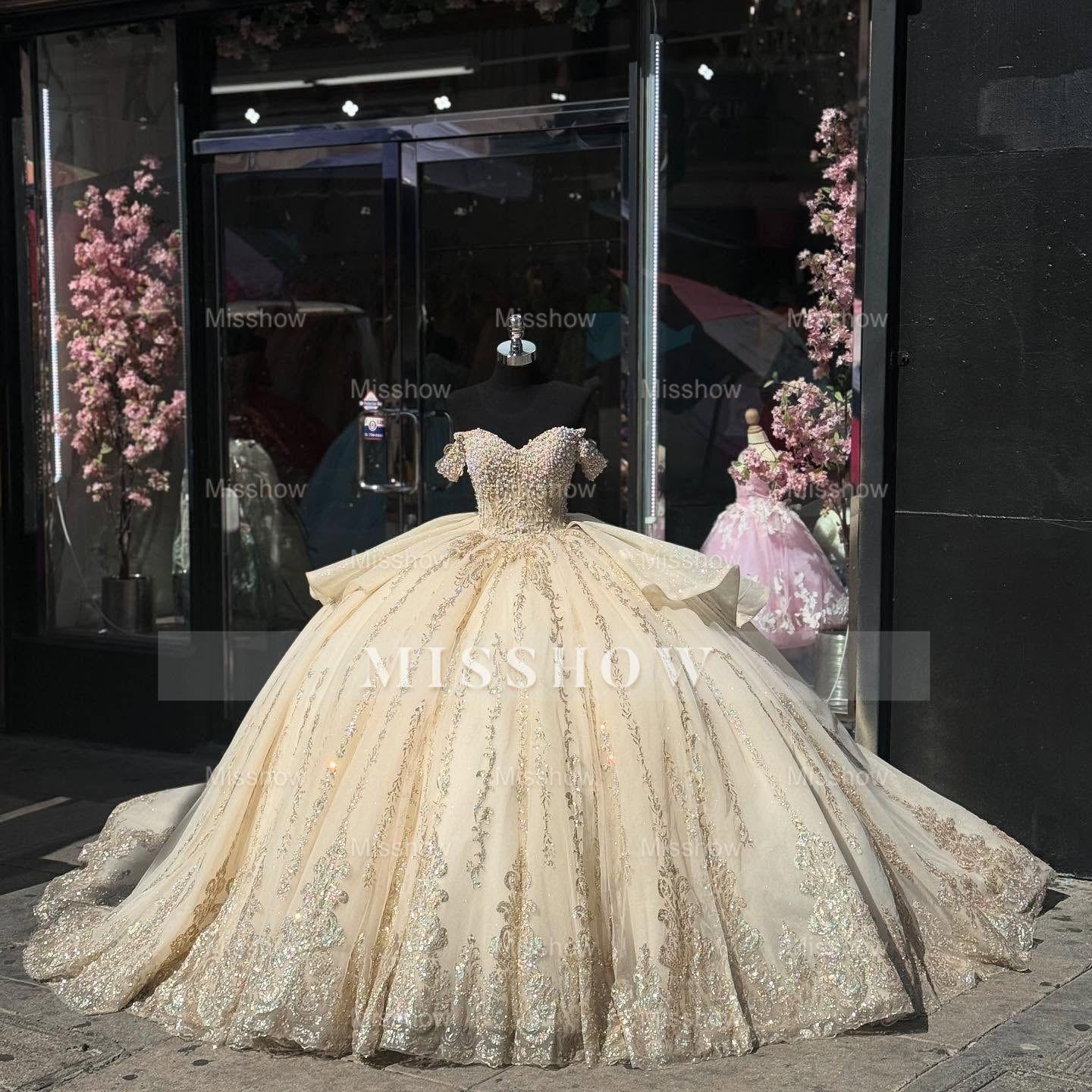 Misshow Champagne Gold Beaded Ball Gown Off-Shoulder Sleeveless Quinceanera Dress with Tulle Skirt & Bow Detail for Sweet 16 Birthday & Formal Events