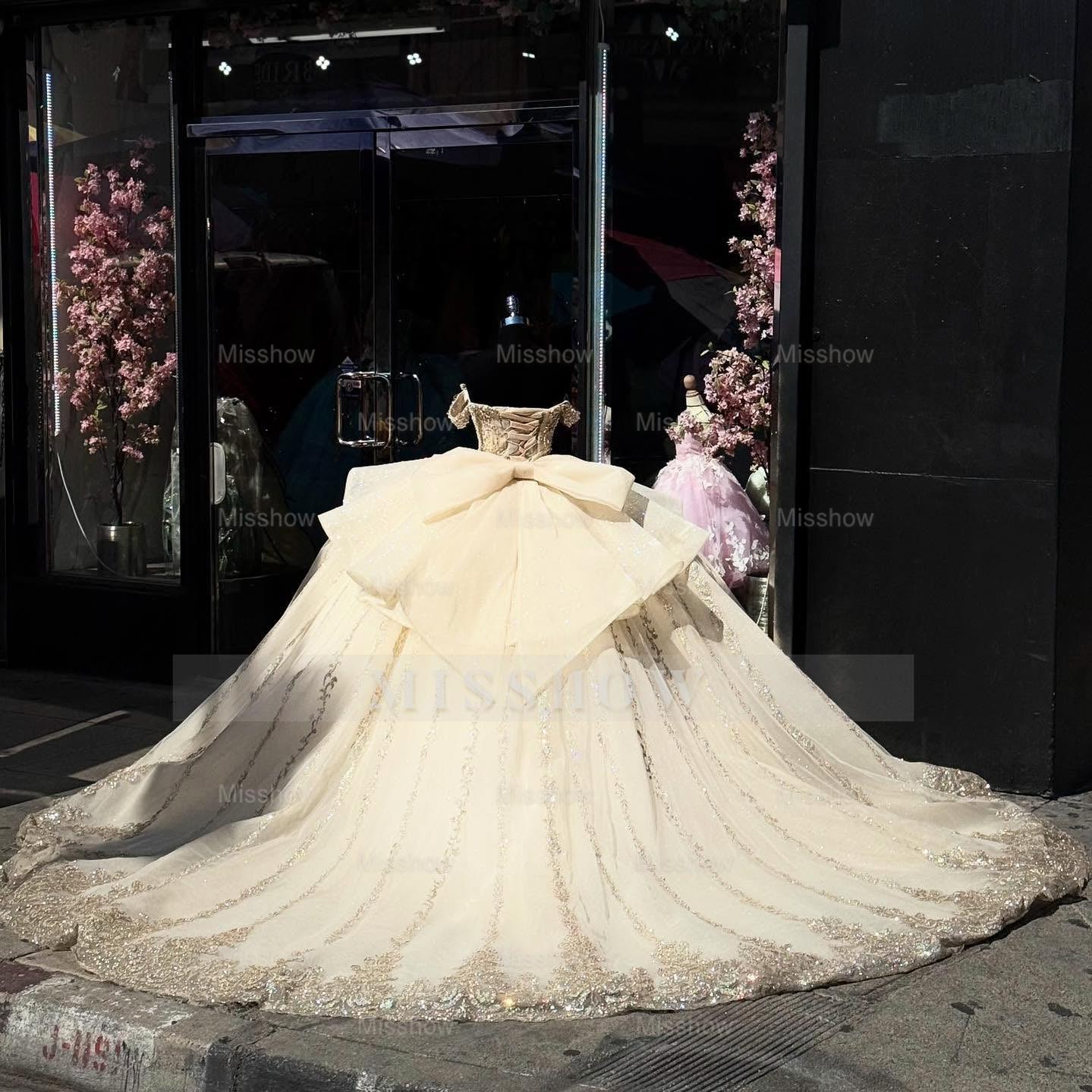 Misshow Champagne Gold Beaded Ball Gown Off-Shoulder Sleeveless Quinceanera Dress with Tulle Skirt & Bow Detail for Sweet 16 Birthday & Formal Events