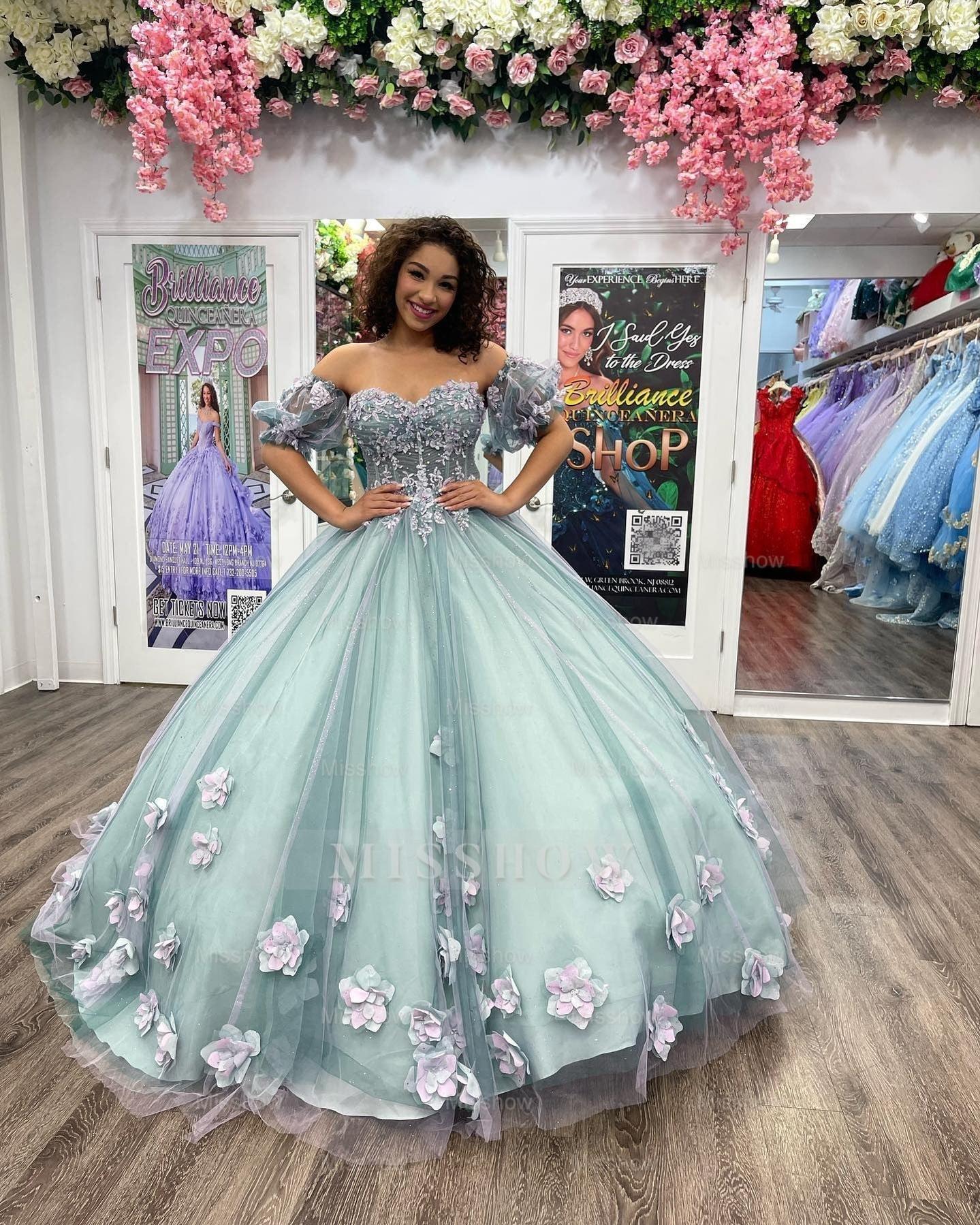 Misshow Off-Shoulder Ball Gown with Puff Sleeves 3D Floral Lace Appliques & Beaded Blue Tulle Perfect for Quinceanera & Sweet 16 Formal Events