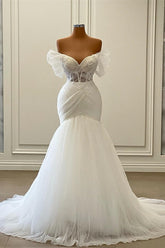 White off-the-shoulder puff sleeve lace corset mermaid wedding dress with train
