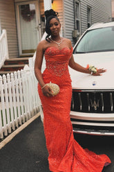 Orange Mermaid Prom Dress Strapless Sweetheart Heavy Crystal Rhinestone Beading Cluster Bodice All-Over Orange Sequin Gold Scroll Vine Lace Embroidery Scattered Rhinestone Sweep Train Gown