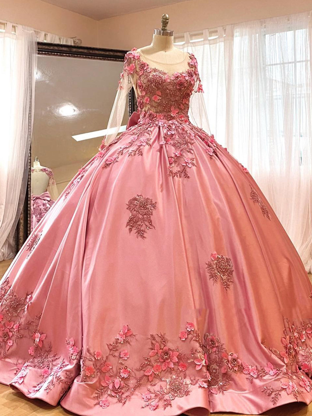 Pink Illusion Long Sleeve 3D Floral Applique Beaded Bow Ball Gown Quinceanera Dress