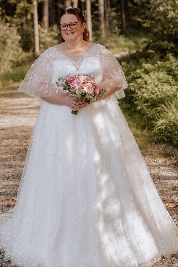 Plus Size White A-Line Wedding Dress V Neck Flutter Cape Sleeves Floral Embroidery Crystal Belt Glitter Tulle Bridal Gown with Sweep Train