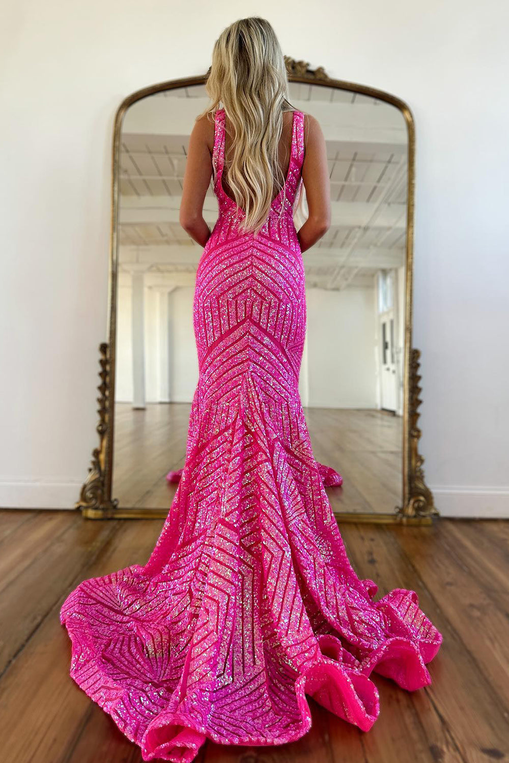 Sequined Mermaid Prom Dress with Deep V-Neck in Fuchsia