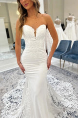 Strapless Plunging Sweetheart Illusion Sheer Boned Corset Stretch Satin Button Back Mermaid Wedding Dress Oversized Lace Appliqué Cathedral Train