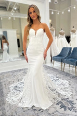 Strapless Plunging Sweetheart Illusion Sheer Boned Corset Stretch Satin Button Back Mermaid Wedding Dress Oversized Lace Appliqué Cathedral Train