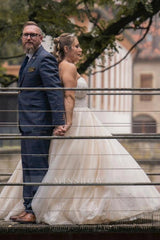 Voluminous Ivory Sweetheart Sleeveless Ball Gown Wedding Dress with Appliques