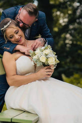 Voluminous Ivory Sweetheart Sleeveless Ball Gown Wedding Dress with Appliques