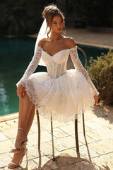 White Lace Mini Wedding Dress Off-the-Shoulder Sweetheart Sheer Illusion Boned Corset Bodice Allover Vine Lace Long Sleeves Scallop Cuff Voluminous Lace Skirt Scallop Hem Short Bridal Gown