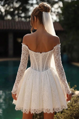 White Lace Mini Wedding Dress Off-the-Shoulder Sweetheart Sheer Illusion Boned Corset Bodice Allover Vine Lace Long Sleeves Scallop Cuff Voluminous Lace Skirt Scallop Hem Short Bridal Gown