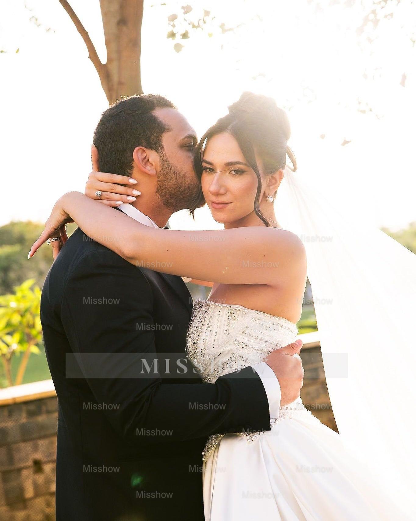 White strapless beaded ball gown wedding dress