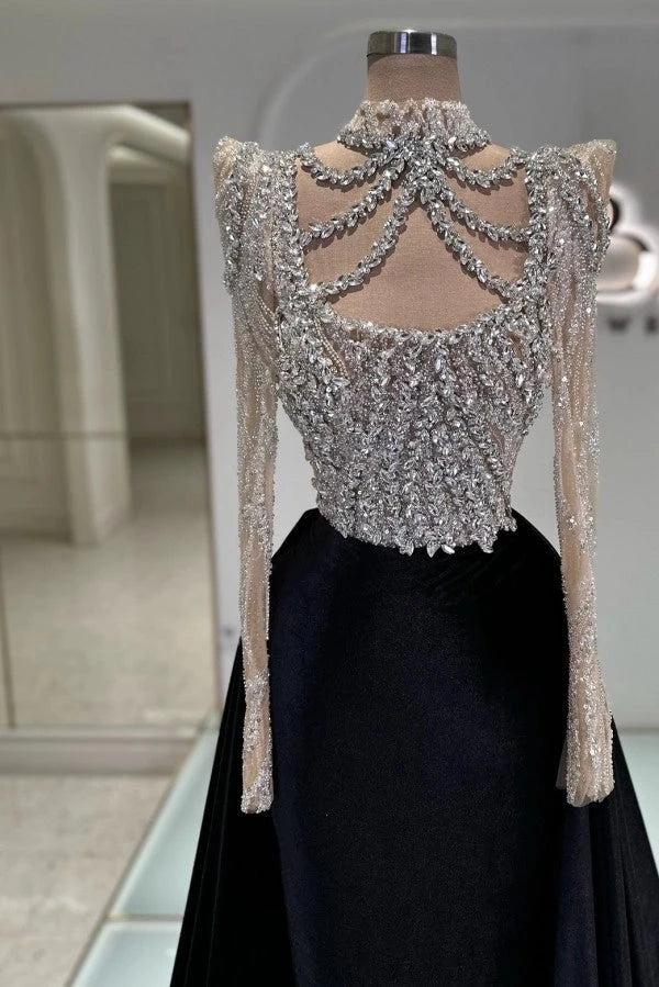 Black Satin Ball Gown Evening Dress High Neck Long Sheer Illusion Sleeves Allover Silver Crystal Gemstone Beaded Corset Bodice Oversized Crystal Chandelier Drape Neckline Structured Shoulder Royal Cathedral Train Formal Gown