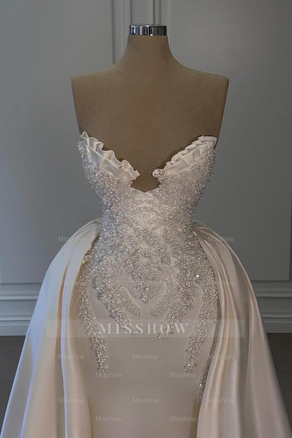 White strapless beaded ball gown wedding dress
