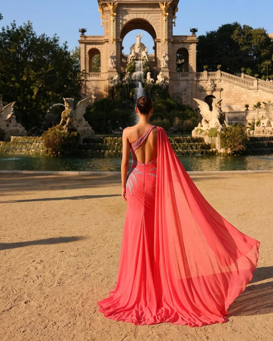 Coral Red Chiffon Cape Mermaid Evening Dress Asymmetric Halter Neck Sleeveless with Drape Crystal Sequin Ruched Open Back Formal Gown