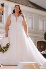Dreamy Ivory V-Neck Sleeveless Ball Gown Wedding Dress with Appliques and Chapel Train