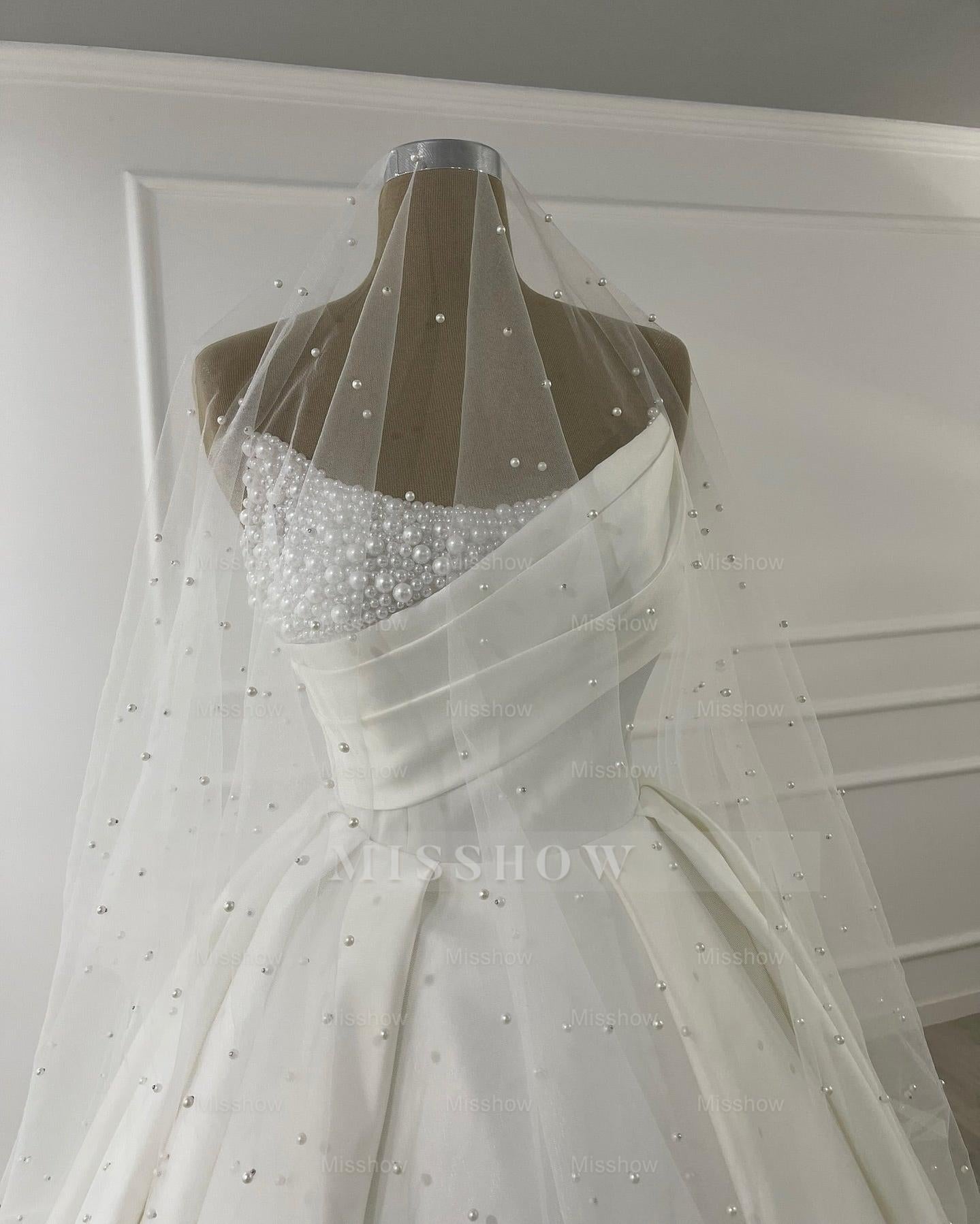 Elegant Ivory Scoop Sleeveless Ball Gown Wedding Dress with Beadings and Chapel Train