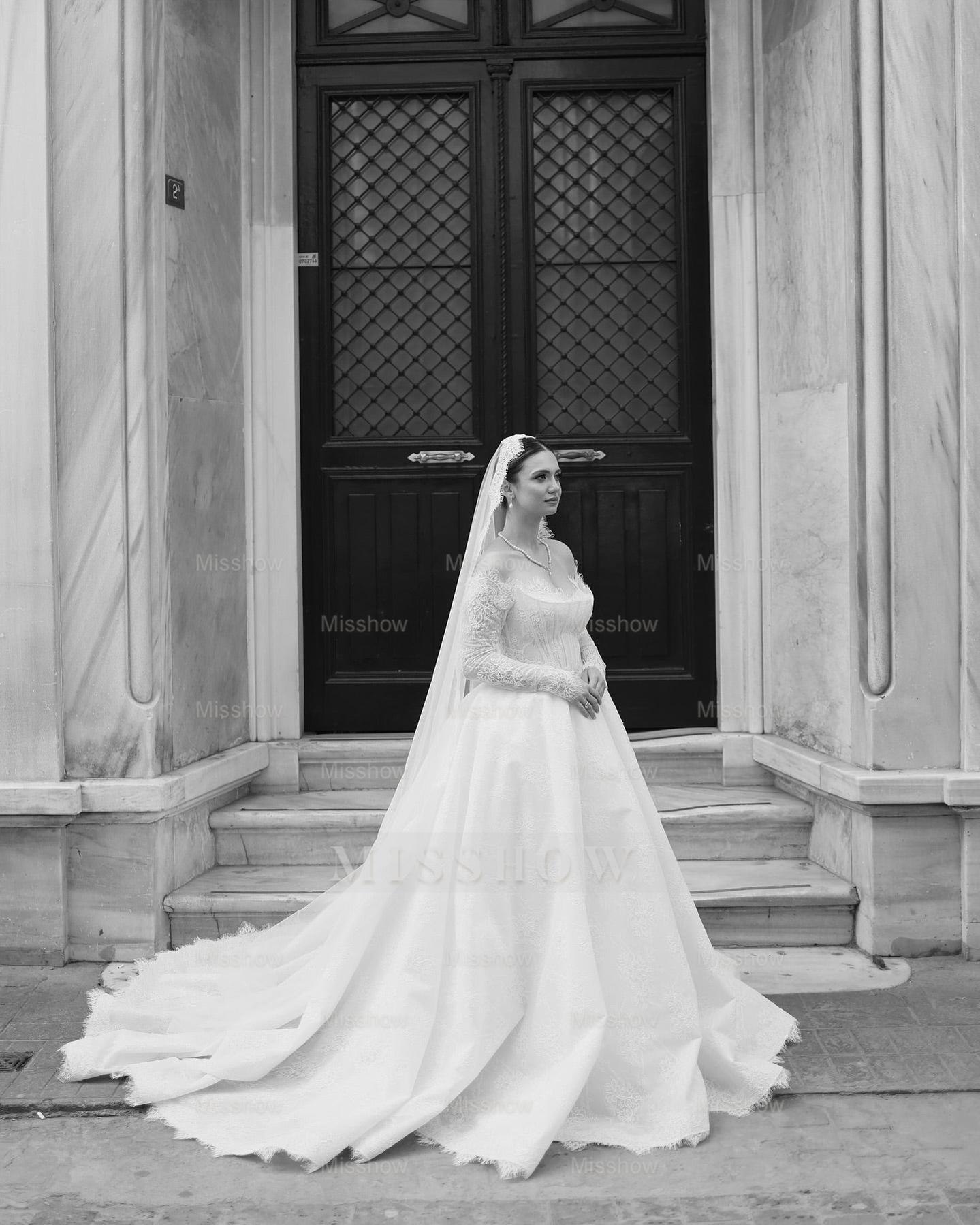 Elegant Ivory Strapless Long-Sleeve Ball Gown Wedding Dress with Chapel Train