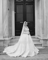 Elegant Ivory Strapless Long-Sleeve Ball Gown Wedding Dress with Chapel Train