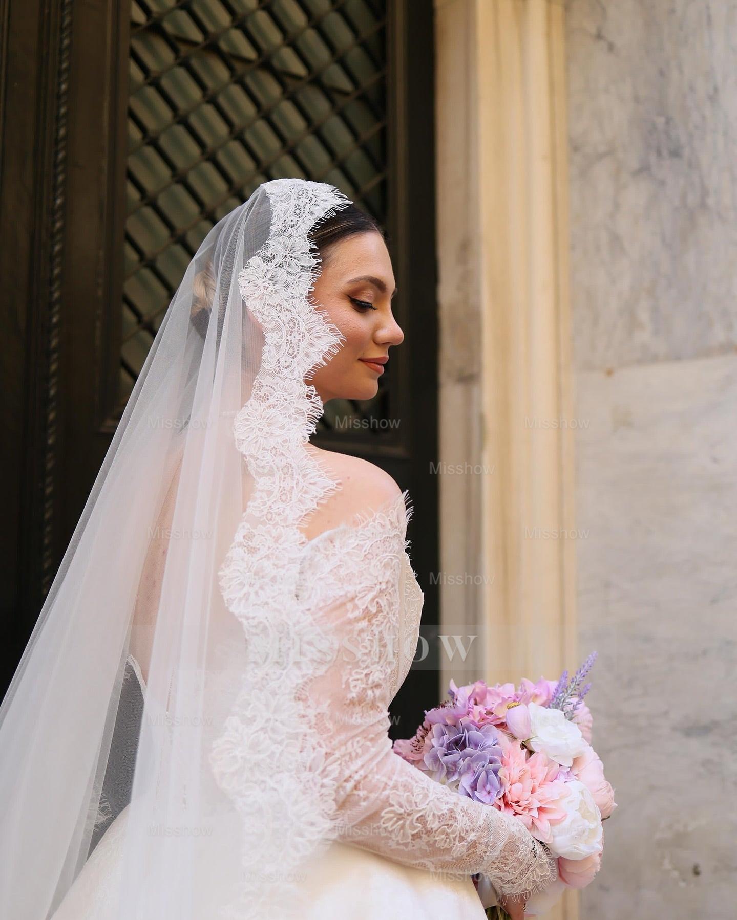 Elegant Ivory Strapless Long-Sleeve Ball Gown Wedding Dress with Chapel Train