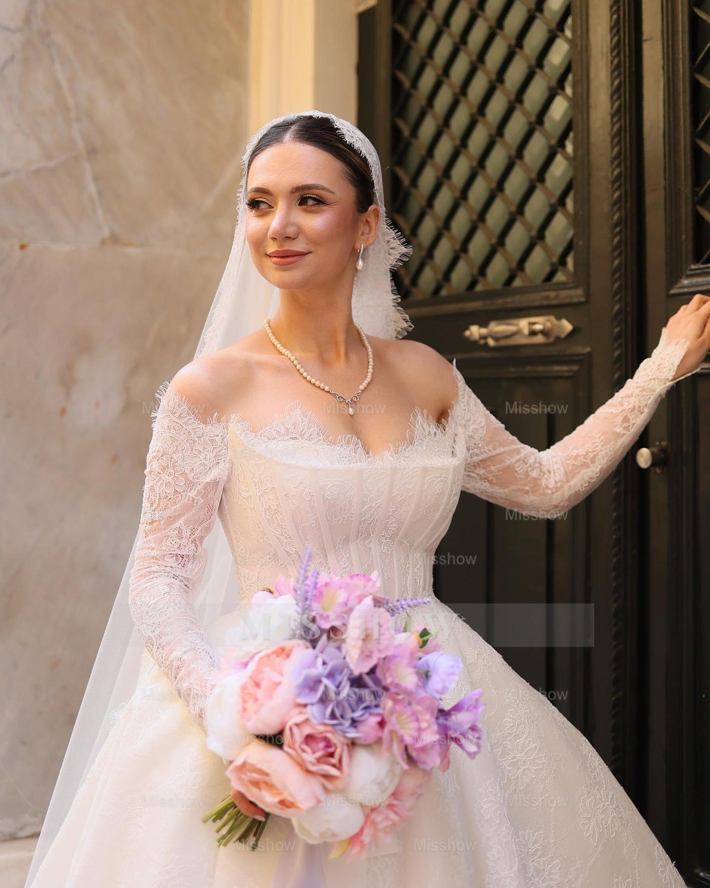 Elegant Ivory Strapless Long-Sleeve Ball Gown Wedding Dress with Chapel Train