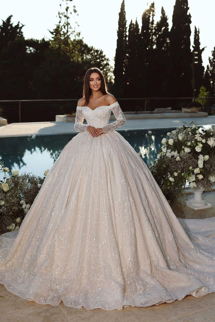 White off-the-shoulder lace ball gown wedding dress