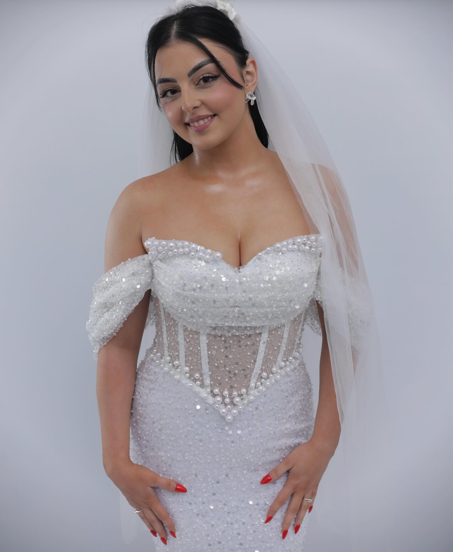 Elegant White Off-The-Shoulder Sleeveless Mermaid Wedding Dress with Sequins and Beadings