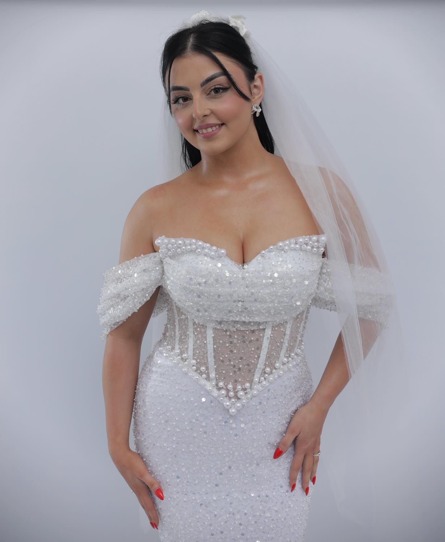 Elegant White Off-The-Shoulder Sleeveless Mermaid Wedding Dress with Sequins and Beadings