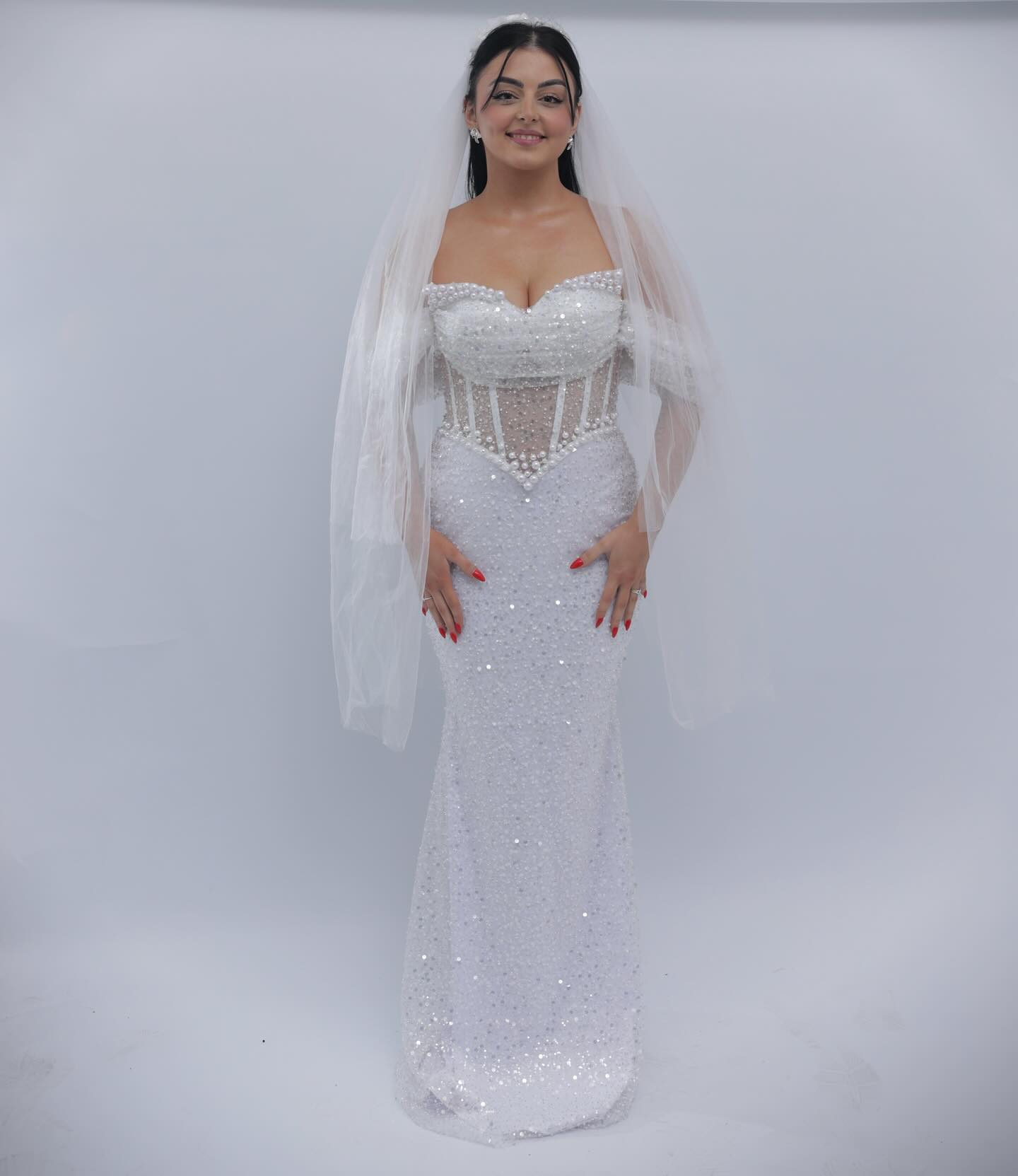 Elegant White Off-The-Shoulder Sleeveless Mermaid Wedding Dress with Sequins and Beadings