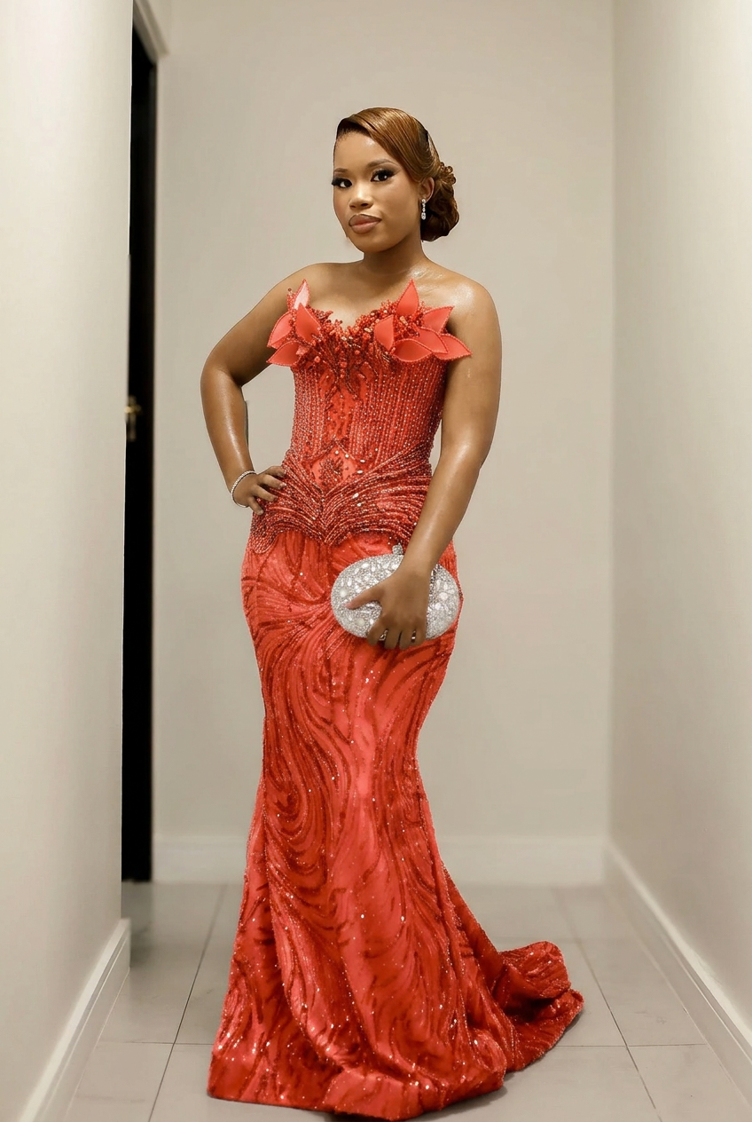 Coral strapless beaded mermaid prom dress