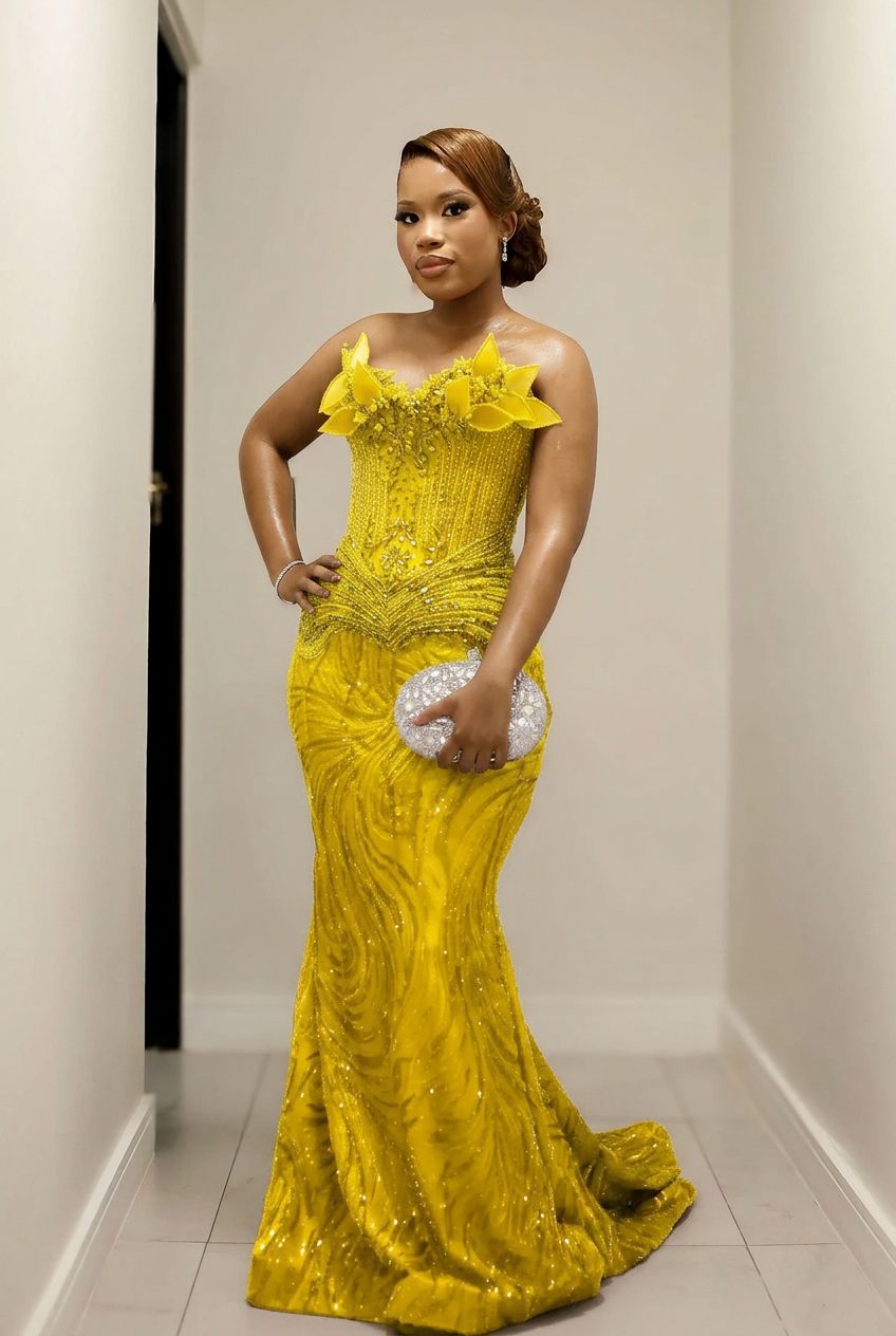Yellow strapless beaded mermaid prom dress