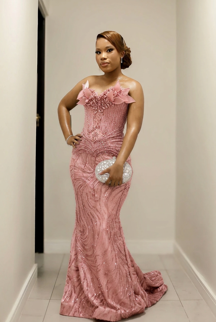 Blushing pink strapless beaded mermaid prom dress