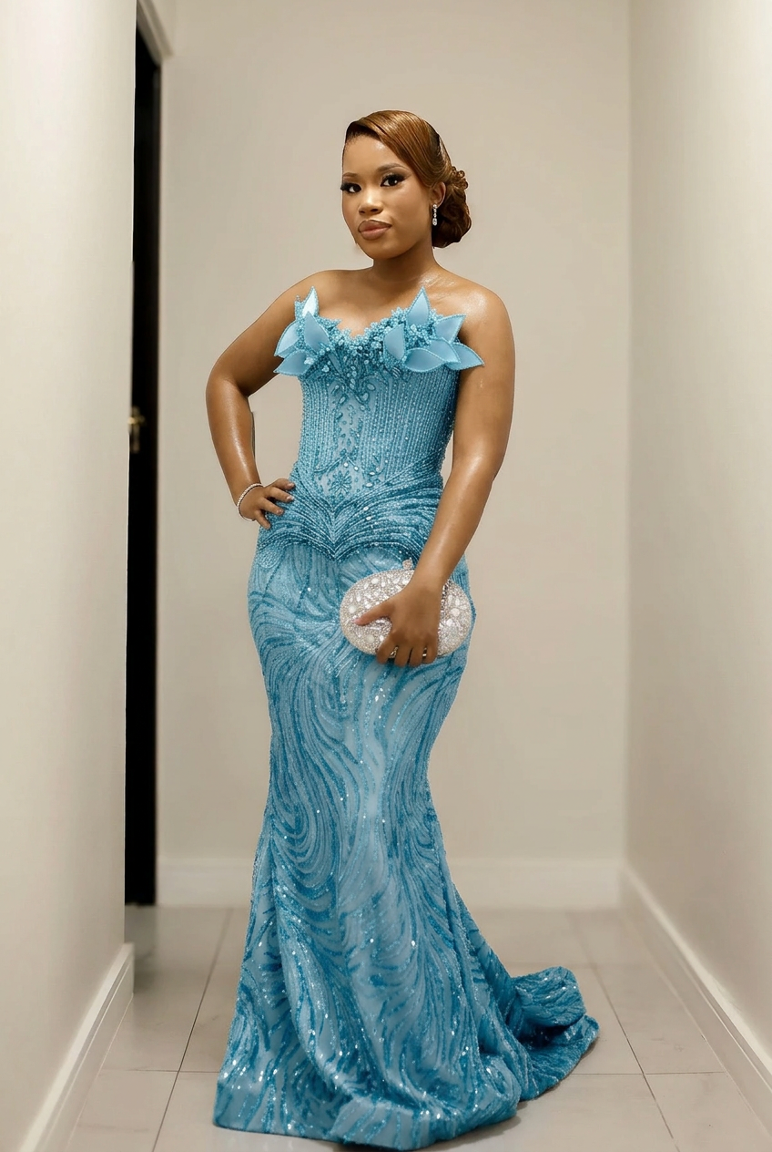 Light blue strapless beaded mermaid prom dress