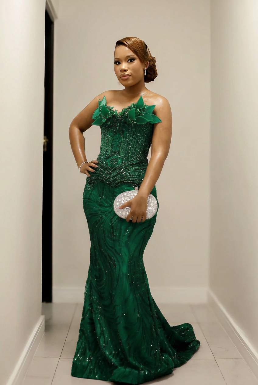 Emerald green strapless beaded mermaid prom dress