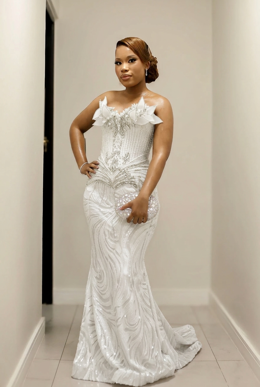 White strapless beaded mermaid prom dress