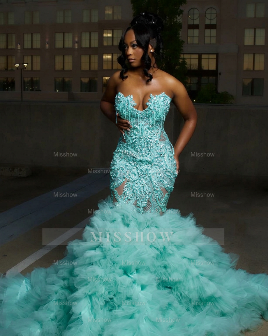 Mint green strapless ruffled mermaid prom dress
