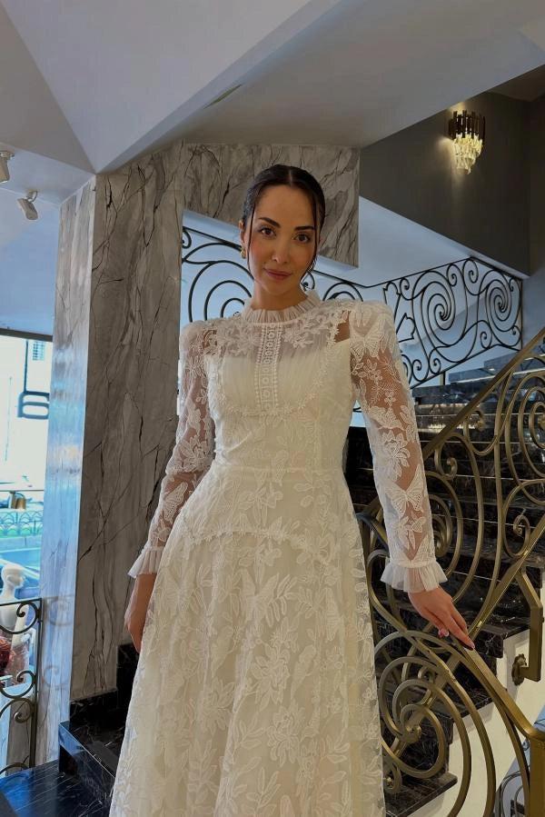 Ivory A-Line Wedding Dress High Neck Pearl Button Long Sheer Lace Sleeves Ruffle Cuff Allover Lace Victorian Modest Bridal Gown