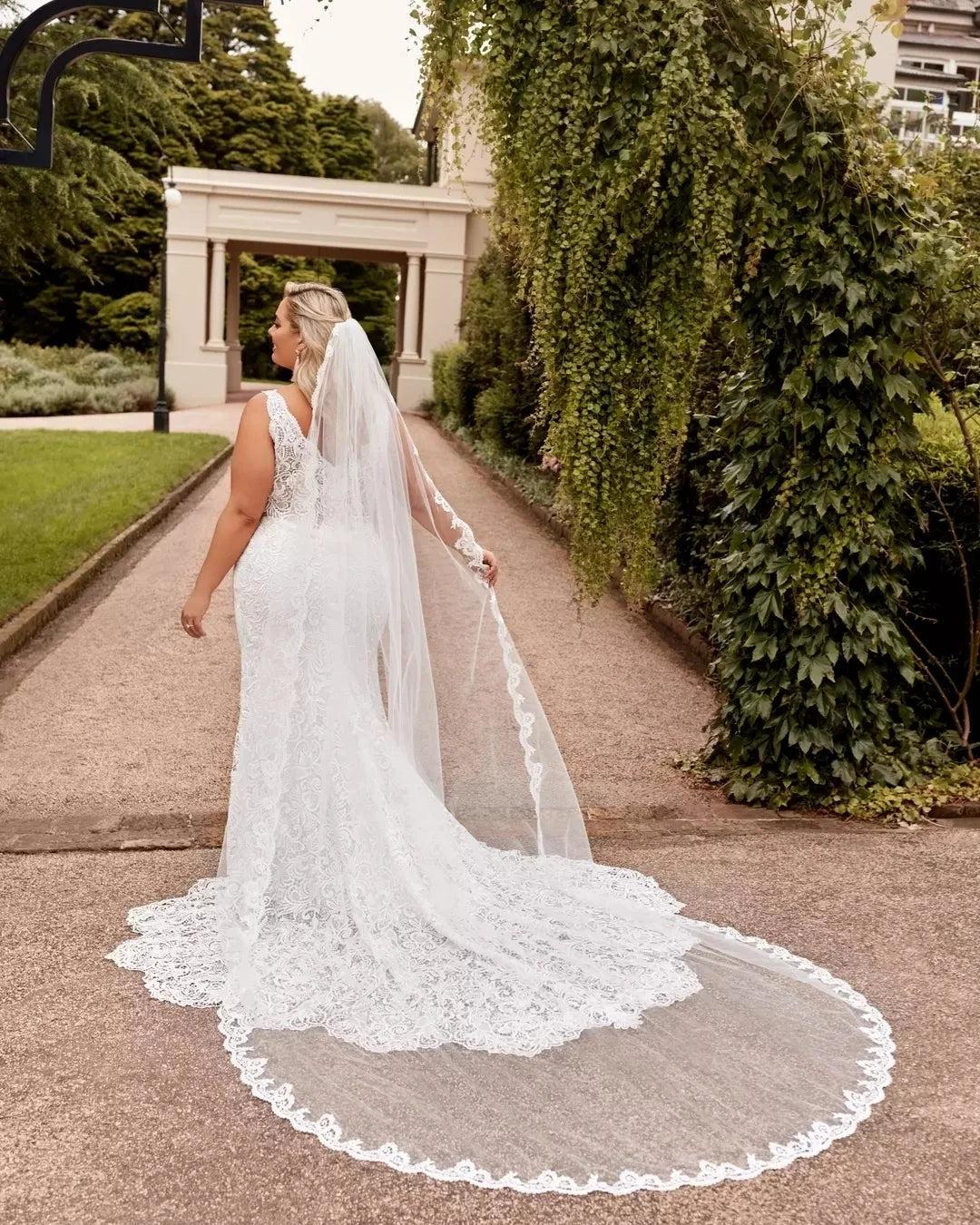 Ivory All-Over Lace Mermaid Wedding Dress V-neck Sleeveless Open Back Cathedral Train Plus Size Bridal Gown