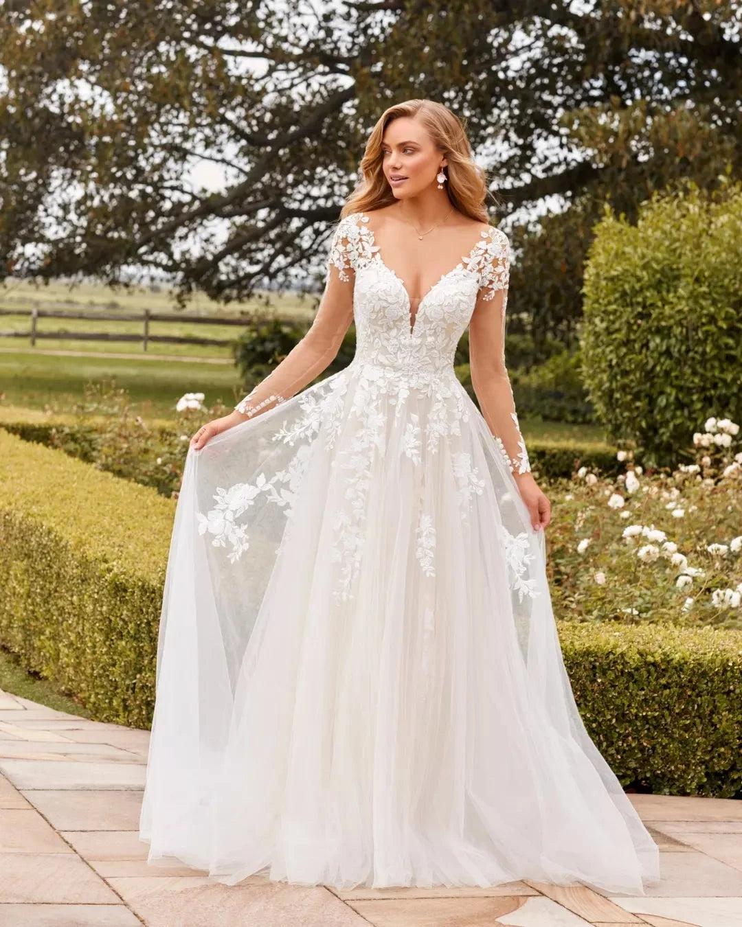 Ivory Lace Applique A-line Wedding Dress V-neck Long Sleeves Illusion Open Back Cathedral Train Bridal Gown