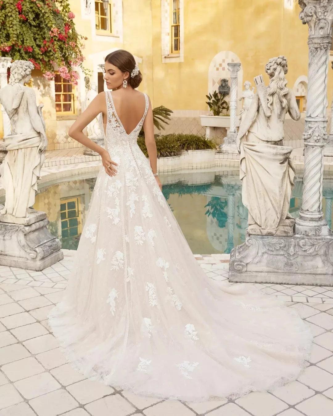 Ivory Lace Applique A-line Wedding Dress V-neck Sleeveless Open Back Cathedral Train Bridal Gown