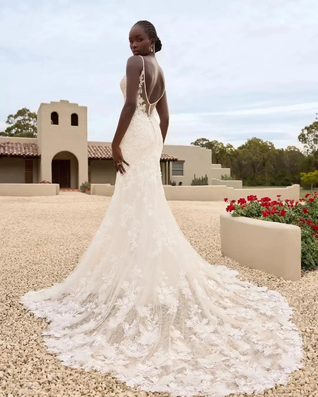 Ivory Lace Applique Mermaid Wedding Dress Spaghetti Straps V-Neck Open Back Covered Buttons Cathedral Train Bridal Gown