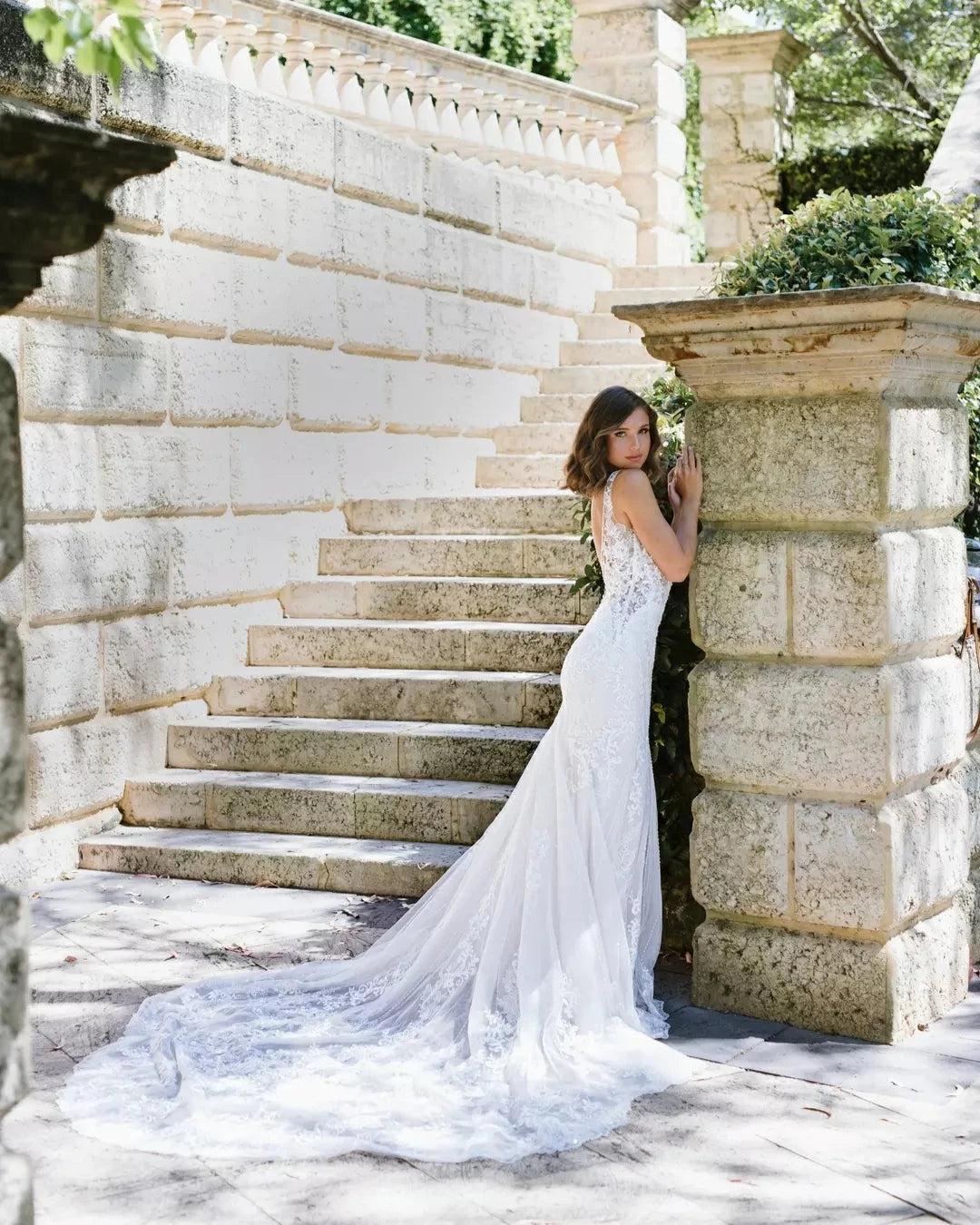 Ivory Lace Applique Mermaid Wedding Dress V-Neck Sleeveless Open Back Sweep Train Bridal Gown